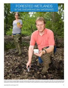 FORESTED WETLANDS IN THE CHESAPEAKE BAY WATERSHED PEGGY GREB (D1745-1)  USDA Forest Service ecologist Megan Lang uses a global positioning system to determine an area’s exact location while ARS soil scientist Greg McCa