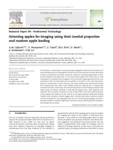 Orienting apples for imaging using their inertial properties and random apple loading