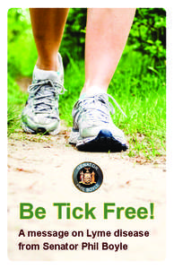 Woman walking on trail in forest