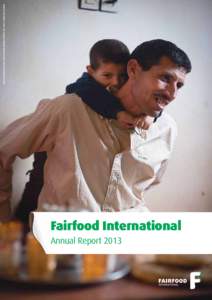 Fairfood International  Annual Report 2013 Moroccan tomato picker Lahcen Moski playing with his son after a long day of work