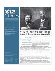 Gloria Mencer and Bill Thornton proudly display B&W Y-12’s two U.S. Small Business Administration awards. the  times