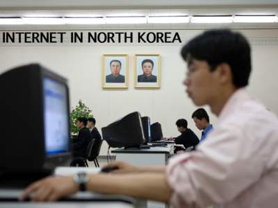 INTERNET IN NORTH KOREA  Poster in a school in Pyongyang. The technology can often be seen in the propaganda stuff, specially in the remote areas, even if few can access to it. North Korea is not linked to the Internet.