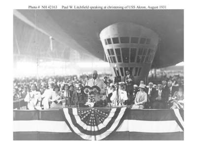 Rear Admiral William A. Moffett speaks during the christening ceremony of the U.S.S. Akron (ZRS-4)  First Lady Lou Hoover releases s flight of pigeons during the christening ceremony of the U.S.S. Akron (ZRS-4)  Banne