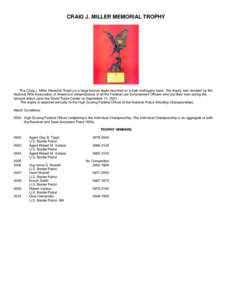 CRAIG J. MILLER MEMORIAL TROPHY  The Craig J. Miller Memorial Trophy is a large bronze eagle mounted on a dark mahogany base. The trophy was donated by the National Rifle Association of America in remembrance of all the 