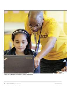 PHOTO / THE LEARNING ACCELERATOR / COURTESY ROGERS FAMILY FOUNDATION  Teacher Pete Knight works with students at Madison Park Academy 34