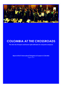 COLOMBIA AT THE CROSSROADS The vital role of lawyers and human rights defenders for real justice and peace Report of the IV International Delegation of Lawyers to Colombia August 2014