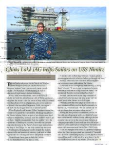 Lt. Kristin Seewald, the staff judge advocate for the Naval Air Warfare Center Weapons Division and the Naval Air Weapons Station China Lake, takes a look around the deck of USS Nimitz. (U.S. Navy photo) China Lake JAG h