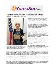 YUHSD earns District of Distinction award Yuma Union only district in state to receive honor A local high school district recently earned the District of Distinction award for 2014 from the Beat the Odds Institute, an in