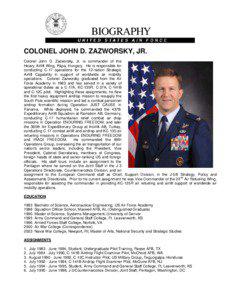 COLONEL JOHN D. ZAZWORSKY, JR. Colonel John D. Zazworsky, Jr. is commander of the Heavy Airlift Wing, Pápa, Hungary. He is responsible for
