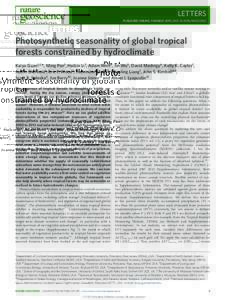 Photosynthetic seasonality of global tropical forests constrained by hydroclimate