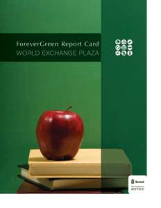 red apple on school books with green background