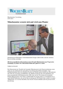 Münchenstein: Verwaltung[removed]Münchenstein vernetzt sich und wird zum Pionier  Orientierung per Bildschirm: Gemeindepräsident Giorgio Lüthi (rechts) und der vonseiten