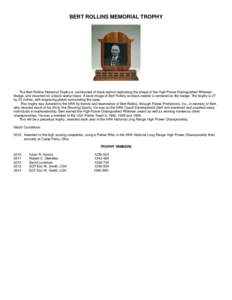 BERT ROLLINS MEMORIAL TROPHY  The Bert Rollins Memorial Trophy is constructed of black walnut replicating the shape of the High Power Distinguished Rifleman Badge, and mounted on a black walnut base. A laser image of Ber