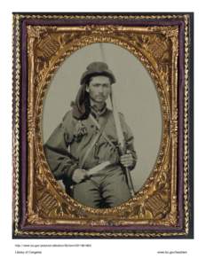 Unidentified soldier in Confederate infantry uniform with musket and Bowie knife